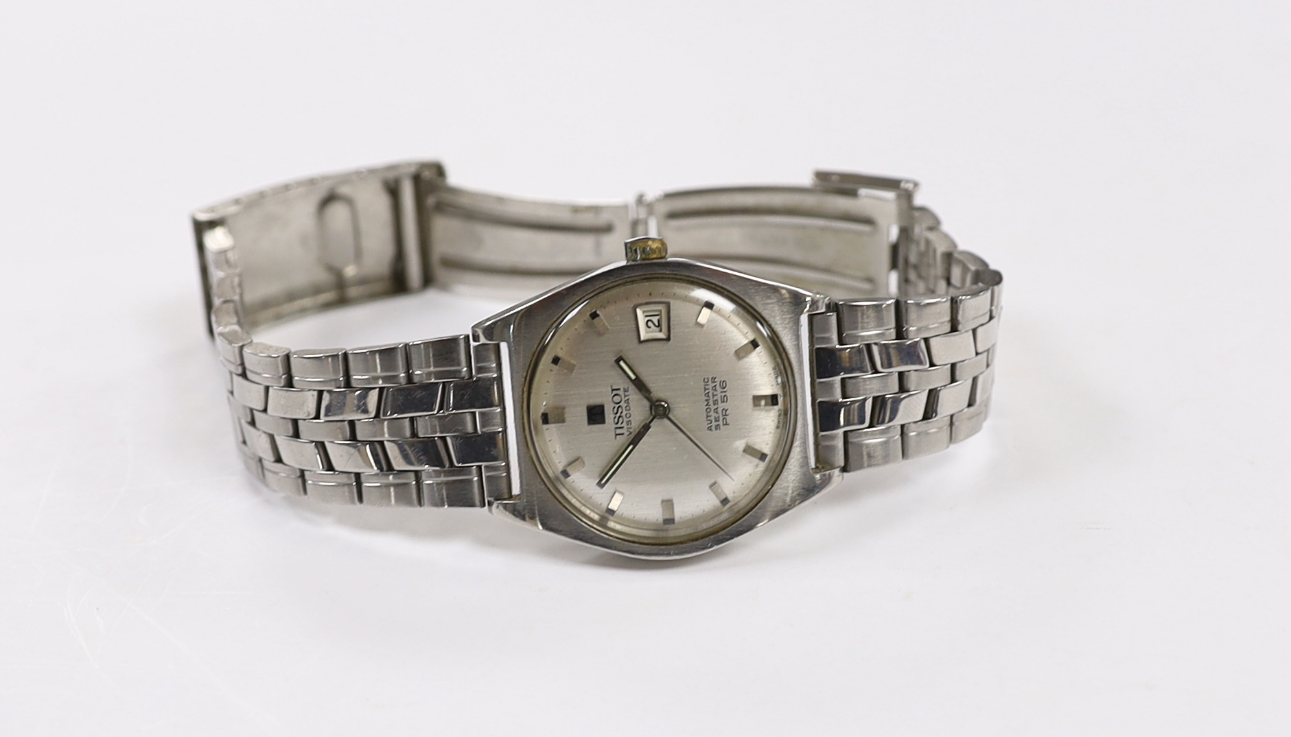 A gentleman's stainless steel Tissot Visodate Seastar automatic wrist watch, on a stainless steel bracelet.